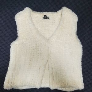 White faux fur vest
